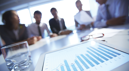 business-meeting-with-financial-chart-on-tablet